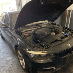 Rivera's Mechanic Shop - BMW service: Valve cover gasket, timing chain, brakes, rotors, carbon cleaning, oil change