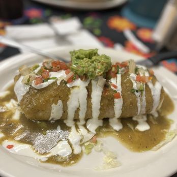 La Capital Cafe and Grill Restaurant - Wet chimichanga with green sauce - Mexican Near Me - Carson City, Nevada La Capital Cafe and Grill Restaurant - Wet chimichanga with green sauce - Mexican Near Me - Carson City, Nevada