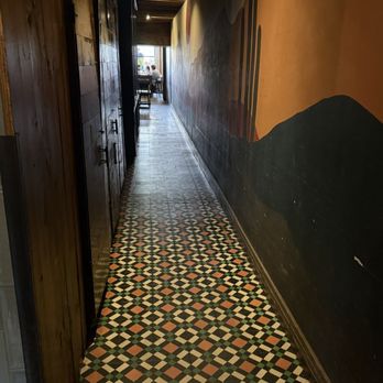 Crave Kitchen and Bar - View from bathrooms down long hallway towards dining room - New American Near Me - El Paso, Texas Crave Kitchen and Bar - View from bathrooms down long hallway towards dining room - New American Near Me - El Paso, Texas