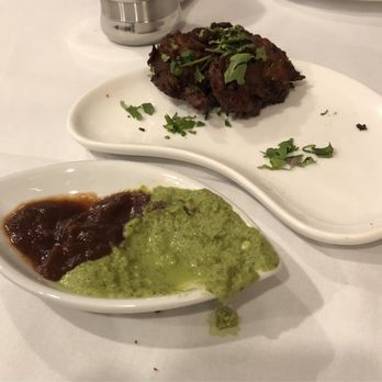 Muna - Onion Pakora with mint and tamarind chutney - Himalayan/Nepalese Near Me - New York, New York Muna - Onion Pakora with mint and tamarind chutney - Himalayan/Nepalese Near Me - New York, New York