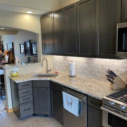Legends Kitchen & Bath - Waypoint Stone cabinetry, Bianco Typhoon granite countertops