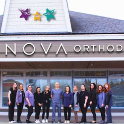 Nova Orthodontics - Exterior View of Office with team