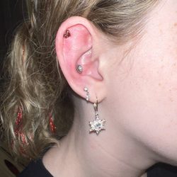 Studio 66 Piercing - Conch and helix piercing