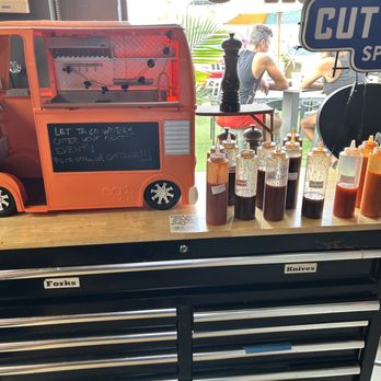 Taco Works - a display of condiments and condiments - Tacos Near Me - Cape Coral, Florida Taco Works - a display of condiments and condiments - Tacos Near Me - Cape Coral, Florida