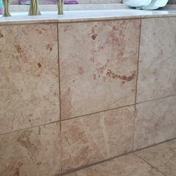 ER Restoration - After tile put back, held by magnets, and tub faucets changed. Soft caulking applied just for cosmetics. - Damage Restoration Near Me - San Jose, California