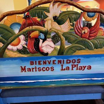 Mariscos La Playa - Artwork on the benches - Seafood Near Me - Albuquerque, New Mexico