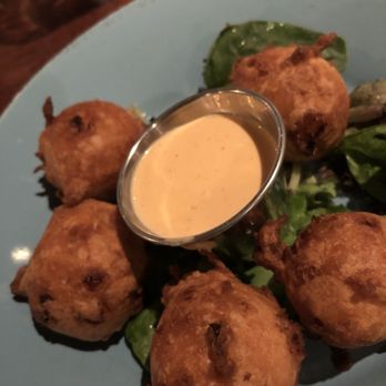 Sea Level NC - Hush puppies... sauce was very good and spicy! - Seafood Near Me - Charlotte, North Carolina Sea Level NC - Hush puppies... sauce was very good and spicy! - Seafood Near Me - Charlotte, North Carolina
