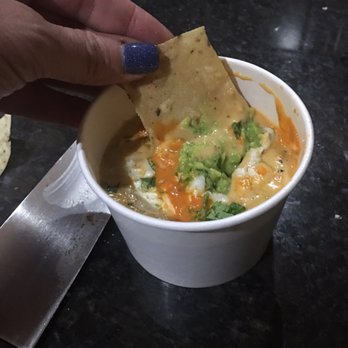 Torchy's Tacos - The queso has a huge dolop of guacamole right in the middle of it!!! - Tex-Mex Near Me - Cedar Park, Texas Torchy's Tacos - The queso has a huge dolop of guacamole right in the middle of it!!! - Tex-Mex Near Me - Cedar Park, Texas
