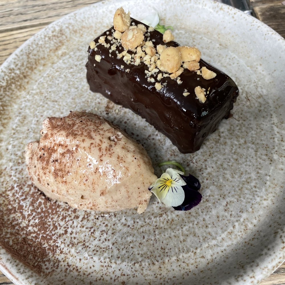 Mildreds - S'nickers fudge cake - Salad Near Me - London, XGL Mildreds - S'nickers fudge cake - Salad Near Me - London, XGL