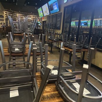 Burg & Barrel - Lenexa - All of the chairs on the table 30 minutes ahead of closing during the Super Bowl we called ahead to confirm they were showing. - Burgers Near Me - Lenexa, Kansas