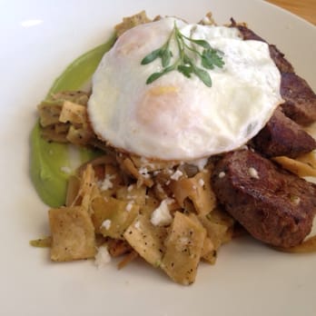 Early Bird - Steak Chilaquiles Verde with over easy eggs. Really good! - New American Near Me - Fullerton, California