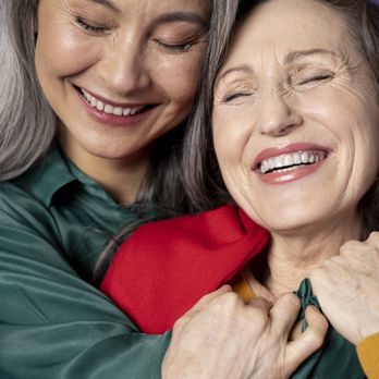 Friendly Home Care - Compassionate caregiver is hugging her patient . - Home Health Care Near Me - Chicago, Illinois Friendly Home Care - Compassionate caregiver is hugging her patient . - Home Health Care Near Me - Chicago, Illinois