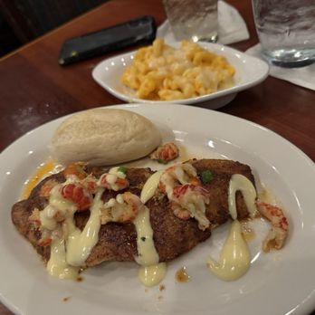 Felix's Fish Camp - redfish with crawfish sauce - Seafood Near Me - Spanish Fort, Alabama Felix's Fish Camp - redfish with crawfish sauce - Seafood Near Me - Spanish Fort, Alabama