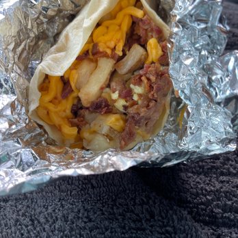 Nathan's BBQ - Beans, regular potatoes (they also have seasoned), American cheese (cheddar is also available), bacon and eggs. - Barbeque Near Me - Brenham, Texas