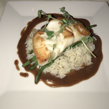 Village Green Restaurant - Cod over jasmine rice in a curry sauce. The cod was so fresh! - French Near Me - Ridgewood, New Jersey Village Green Restaurant - Cod over jasmine rice in a curry sauce. The cod was so fresh! - French Near Me - Ridgewood, New Jersey