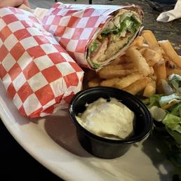 Falafel wrap looked tasty until seeing/tasting the burned wrap