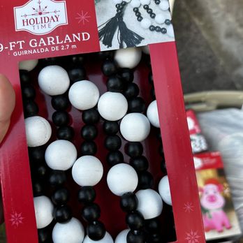 Walmart Supercenter - a hand holding a package of black and white beads - Department Stores Near Me - Miami, Florida Walmart Supercenter - a hand holding a package of black and white beads - Department Stores Near Me - Miami, Florida