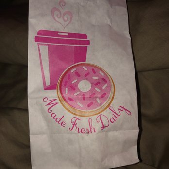 N'Star Donuts - a paper bag with a donut and a cup of coffee - Donuts Near Me - Austin, Texas N'Star Donuts - a paper bag with a donut and a cup of coffee - Donuts Near Me - Austin, Texas