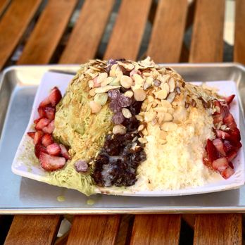 Dzert - Half&Half green tea and milk snow. Toppings of strawberries, almonds, red bean, condensed milk, mochi, bean powder. $10.45 (+$.50/topping) - Coffee & Tea Near Me - Buena Park, California Dzert - Half&Half green tea and milk snow. Toppings of strawberries, almonds, red bean, condensed milk, mochi, bean powder. $10.45 (+$.50/topping) - Coffee & Tea Near Me - Buena Park, California