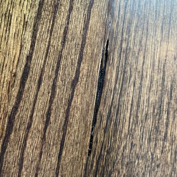 Ryans Hardwood Flooring - a closeup of a piece of wood - Flooring Near Me Ryans Hardwood Flooring - a closeup of a piece of wood - Flooring Near Me