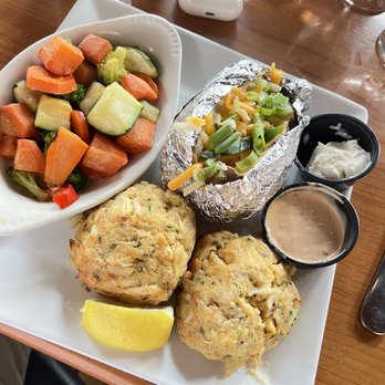 Madigan's Waterfront - Jumbo crab cakes w/bake potato platter and sautéed or grilled veggies. - Seafood Near Me - Occoquan, Virginia