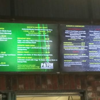 The Patch Grill - menus on a brick wall - American Near Me - Platteville, Colorado