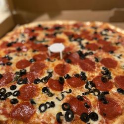 Plum Tomatoes by La Sorrentina - Regular pie with black olives and pepperoni