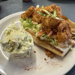 Shrimp Po Boy. Look at the size of those shrimp! The potato salad was also amazing. Everything was delicious! Shrimp Po Boy. Look at the size of those shrimp! The potato salad was also amazing. Everything was delicious!