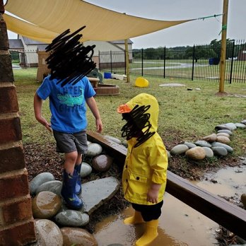 Little Road Montessori - Splashing in puddles. - Montessori Schools Near Me - Kennedale, Texas Little Road Montessori - Splashing in puddles. - Montessori Schools Near Me - Kennedale, Texas