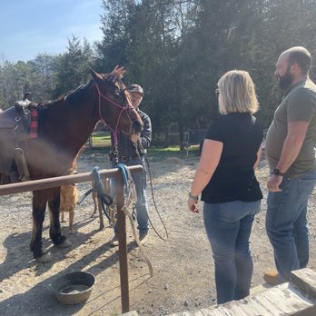 Elite Frontier Adventures - Learning a small story about each horse before our ride. - Horseback Riding Near Me - Rogersville, Tennessee