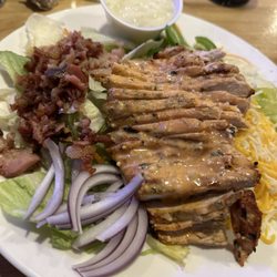 Kenicky's Public House - Grilled chicken salad with a wing sauce on it makes a great meal