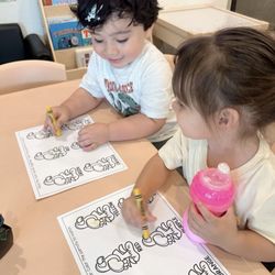 My daughter and her classmate enjoying coloring together