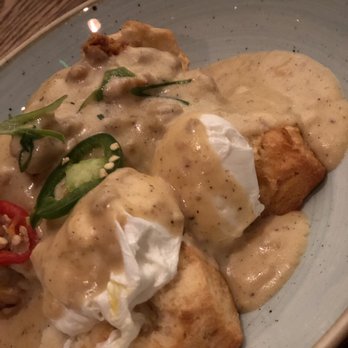 Yardbird - Biscuits and country gravy, pouched eggs  and fried chicken - Southern Near Me - Las Vegas, Nevada