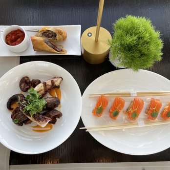 Skyhigh - Appetizers:  Top: cheesesteak egg rolls  Bottom left: chargrilled octopus  Bottom right: crispy rice salmon - Bars Near Me - Philadelphia, Pennsylvania