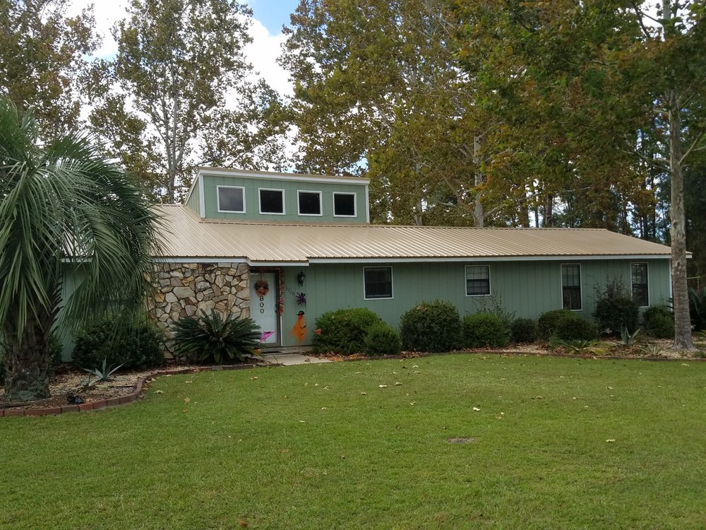 Slide of Omega Metal Roofing