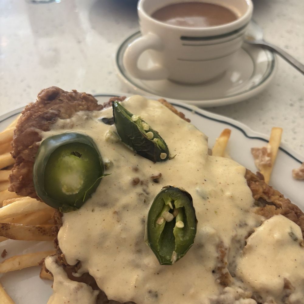 Marfa Texas Kitchen - Chicken fried steak and fries with jalapeño gravy - New American Near Me - College Station, Texas Marfa Texas Kitchen - Chicken fried steak and fries with jalapeño gravy - New American Near Me - College Station, Texas