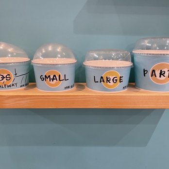 Iceskimo - Inside: serving cup size examples on shelf along left wall - Ice Cream & Frozen Yogurt Near Me - San Diego, California