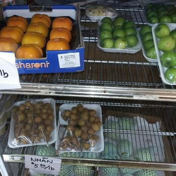 Little Saigon Market - Persimmon, not sure and longans on bottom. - Grocery Near Me - Tampa, Florida Little Saigon Market - Persimmon, not sure and longans on bottom. - Grocery Near Me - Tampa, Florida