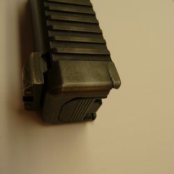 D Street Gunsmithing - Glock slides are tough, but they will still crack if you drop them on hard surfaces.  This slide had to be replaced.