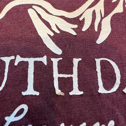 Black Hills Souvenirs & Gifts - You can see the stencil lifting. This is brand new.