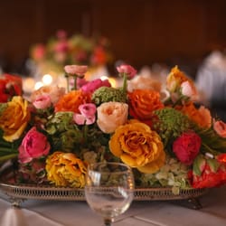 Dunn and Sonnier Flowers - Beautiful mix of garden roses, ranunculus, peonies, hydrangea and other stems presented in a loose style on a silver platter.