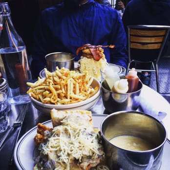 Jacob's Pickles - MUSHROOM GRAVY OVER SOUTHERN FRIED CHICKEN & FLUFFY BISCUITS. Amazing.  Chicken BLT on his end. Cheesy grits. Enough fries for 10 people. - Comfort Food Near Me - New York, New York