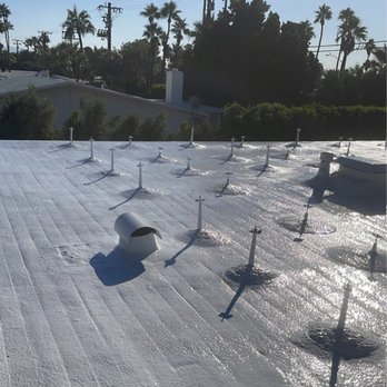 Valley Urethane Foam Roofing - Created "islands" to drain the roof penetrations for the solar. Well done. - Roofing Near Me - Cathedral City, California Valley Urethane Foam Roofing - Created "islands" to drain the roof penetrations for the solar. Well done. - Roofing Near Me - Cathedral City, California