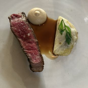 Heritage - 32-Day Dry Aged Rib Chop, with an Oxtail ravioli with celery root as the pasta component for the ravioli - Modern European Near Me - Long Beach, California