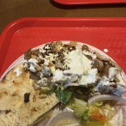 Mixed plate with Greek salad and rice. Added my tzatziki to the top of my meat already and pita on side. Mixed plate with Greek salad and rice. Added my tzatziki to the top of my meat already and pita on side.