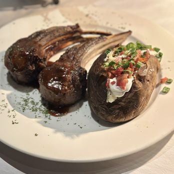 Epic Chophouse - DOUBLE CUT RACK OF LAMB with loaded baked potato - Seafood Near Me - Greensboro, North Carolina Epic Chophouse - DOUBLE CUT RACK OF LAMB with loaded baked potato - Seafood Near Me - Greensboro, North Carolina