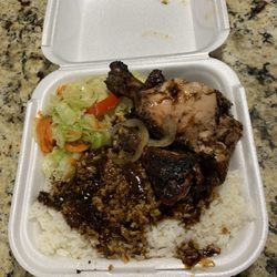 Better Jerk Jamaican - Jerk Chicken Dinner, Cabbage, ox tail gravy. My boyfriend had this dinner and it was so mf delicious. 11/10.