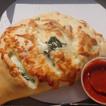 Jesse's Little Kitchen - Spinach & Ricotta Calzone - Pizza Near Me - Island Pond, Vermont Jesse's Little Kitchen - Spinach & Ricotta Calzone - Pizza Near Me - Island Pond, Vermont