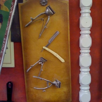 Hair Pros Barber Shop - Display of old-time barbering implements on the wall. The walls are covered with knickknacks. - Barbers Near Me - La Mesa, California Hair Pros Barber Shop - Display of old-time barbering implements on the wall. The walls are covered with knickknacks. - Barbers Near Me - La Mesa, California