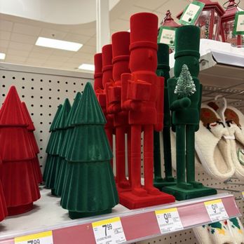 Walgreens - Decorative Christmas nutcracker figures and tree-shaped ornaments are displayed on store shelves, with price tags visible. - Drugstores Near Me - Laurel, Maryland